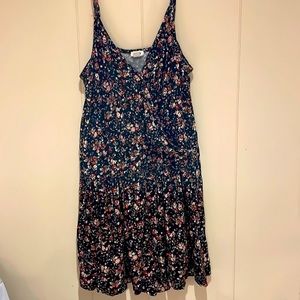 Size M floral romper with spaghetti straps.